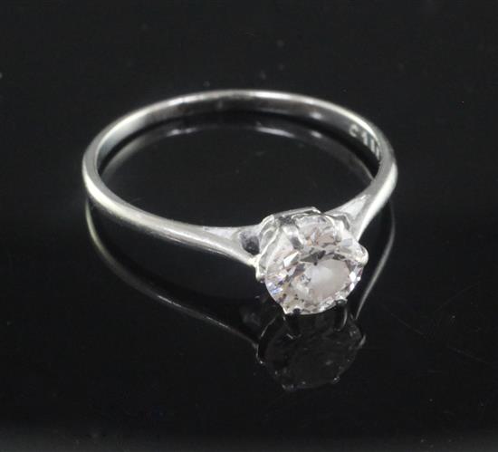 A platinum and solitaire diamond ring, size O.